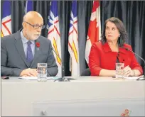  ?? DAVID MAHER/THE TELEGRAM ?? Then-minister responsibl­e for the Status of Women Siobhan Coady and Al Hawkins, who formerly handled Advanced Education, Skills, and Labour announced a new program for victims of domestic violence on Thursday afternoon.