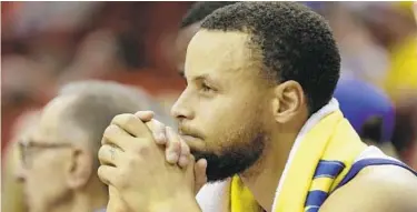  ?? DAVID J. PHILLIP/ASSOCIATED PRESS ?? Warriors guard Stephen Curry has made just one 3-pointer in each of the first two games of the conference finals.