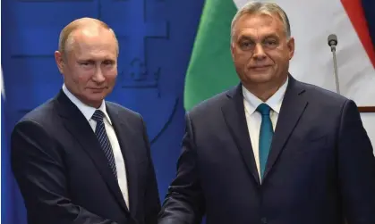  ?? Photograph: Attila Kisbenedek/AFP/Getty Images ?? The Russian president, Vladimir Putin, left, and the Hungarian prime minister, Viktor Orbán, shake hands after a press conference in Budapest in 2019.