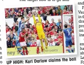  ??  ?? UP HIGH: Karl Darlow
claims the ball