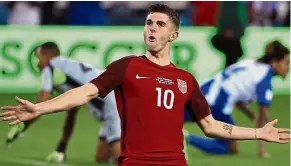  ?? — AFP ?? Ten for a teen: The United States’ Christian Pulisic celebratin­g after scoring against Honduras in the 2018 World Cup qualifier last Friday.