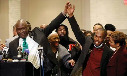  ?? Photograph: Nicholas Pfosi/Reuters ?? George Floyd family attorney Ben Crump (left) holds hands with Donald Williams following the verdict in the trial of former Minneapoli­s police officer Derek Chauvin.