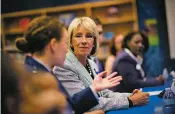  ??  ?? Secretary of Education Betsy DeVos takes a tour of Ashland Elementary School in Manassas, Va., in April.