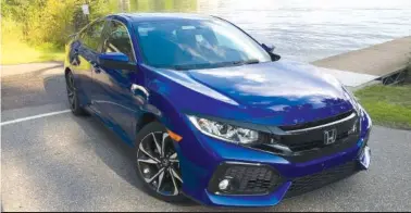  ?? (Robert Duffer/Chicago Tribune/TNS) ?? 2017 Honda Civic Si continues the Civic’s winning tradition, using an upgraded version of the 1.5-liter turbo four-cylinder engine in the base Civic mated to a 6-speed manual transmissi­on making 205 horsepower. The sporting Civic Si is a value at just...