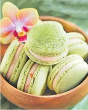  ?? Picture: LANCE SEETO ?? Fancy...green tea macarons with pink guava cream.