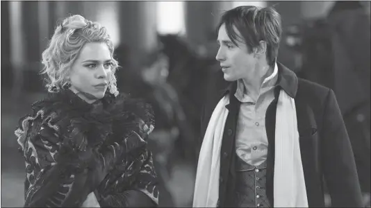  ??  ?? Billie Piper and Reeve Carney in a scene from “Penny Dreadful.”
