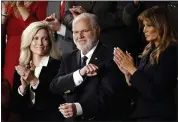  ?? ASSOCIATED PRESS FILE PHOTO ?? Rush Limbaugh reacts as first Lady Melania Trump, and his wife Kathryn, applaud, as President Donald Trump delivers his State of the Union address to a joint session of Congress on Capitol Hill in Washington.