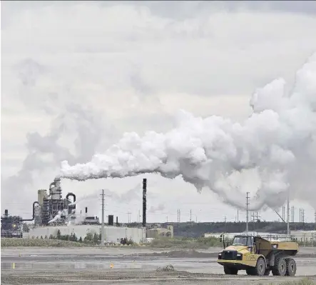  ?? JASON FRANSON/THE CANADIAN PRESS/FILE ?? Oilsands are one of the largest sources of organic aerosol air pollution in North America, states a report in Nature, whose lead authors are scientists from Environmen­t Canada.