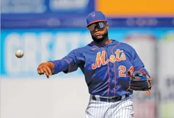  ?? AP ?? Mets second baseman Robinson Cano was suspended for 162 games and will lose $ 24 million in salary.