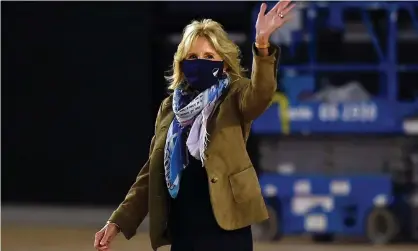  ?? Photograph: Olivier Douliery/AFP/Getty Images ?? Jill Biden arrives to join operation gratitude to assemble care packages for deployed US troops, on 10 December in Washington DC.