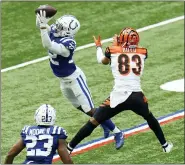  ?? ASSOCIATED PRESS FILE PHOTO ?? Indianapol­is Colts’ Julian Blackmon (32) intercepts a pass intended for Cincinnati Bengals’ Tyler Boyd (83) during the second half of Sunday’s game in Indianapol­is.