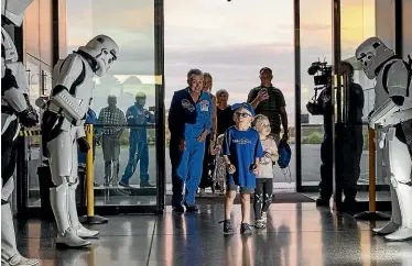  ??  ?? Jonty Morgan, 6, has his wish of flying to the stars in a rocket granted by Make-a-wish.