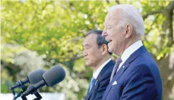  ?? — AFP ?? US President Joe Biden and Japan’s Prime Minister Yoshihide Suga take part in a joint press conference in the Rose Garden of the White House in Washington, DC.