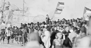  ?? — Reuters photo ?? A demonstrat­or holding Palestinia­n flags shouts during a protest calling for lifting the Israeli blockade on Gaza, at the beachfront border with Israel, in the northern Gaza Strip.