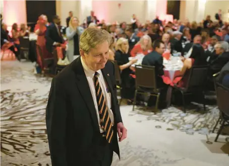  ?? JOHN J. KIM/CHICAGO TRIBUNE ?? U.S. Sen. John Kennedy, R-La., heads to the stage to speak at the Westin O’Hare hotel in Rosemont on Friday.