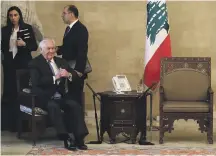  ?? AFP ?? Rex Tillerson waits for several minutes to meet Lebanese President Michel Aoun in Baadba yesterday