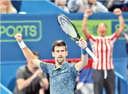  ?? — AFP photo ?? World number one Novak Djokovic comes from a set down to claim a semi-final spot in the Qatar Open.