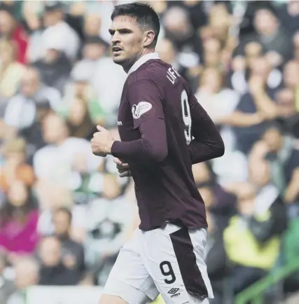  ??  ?? 0 Hearts forward Kyle Lafferty is the latest footballer to admit to having a gambling addiction.