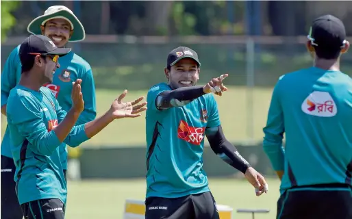  ?? AFP ?? Bangladesh players during a practice session at the P. Sara Oval Cricket Stadium in Colombo on Monday. The second Test starts on Wednesday. —