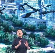  ?? — AFP photo ?? Sang Yup Lee, head of Hyundai Design Centre, talks about the S-A1 electric vertical takeoff and landing (eVTOL) aircraft at the Hyundai news event where Hyundai announced it’s partnershi­p with Uber to create an air taxi network in Las Vegas, Nevada.