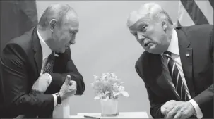  ??  ?? Donald Trump (right) and Vladimir Putin