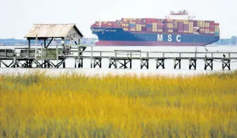  ?? AP ?? The MSC Naomi container ship sails out from from the port of Charleston, South Carolina on October 28, 2021. Hampered by rising COVID-19 cases and persistent supply shortages, the US economy slowed sharply to a 2% annual growth rate in the July-September period.