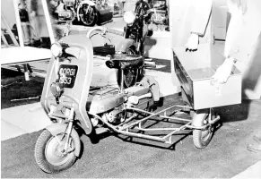  ??  ?? Quirky or what? This miniature box sidecar for, of all things, a 98cc Corgi scooter, was demonstrat­ed at the 1952 Earls Court Show. Ken Hallworth couldn’t resist: “Capable of being parachuted behind enemy lines (it must have put the fear of god into them – Ed) it had reached Mk IV form by 1952, which meant front wheel springing, a steel weathershi­eld and an electric horn, none of which improved its potential for hauling commercial supplies around town…”