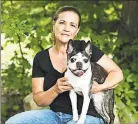  ?? Contribute­d photo ?? Dawn Lowery, owner of One Smart Dog in Shelton, with Manny, her “inspiratio­n dog.” Just like people, dogs have had to acclimate to a new normal, she says.
