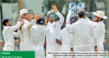  ??  ?? Will stand-in skipper Dimuth Karunaratn­e get to enjoy more high-fives with his team mates in South Africa - File pic