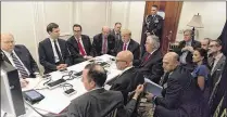  ?? THE WHITE HOUSE / ASSOCIATED PRESS ?? President Donald Trump receives a briefing Thursday night at Mara-Lago about the military strike Trump ordered on a Syrian airbase after Tuesday’s chemical attack.