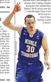  ??  ?? Middle Tennessee State’s Reggie Upshaw from Chattanoog­a celebrates after making a basket
during the 15th-seeded Blue Raiders’ 90-81 victory over No. 2 seed Michigan State in the NCAA tournament Friday. Upshaw scored
21 points.