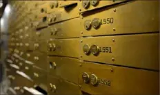  ?? Rebecca Droke/Post-Gazette ?? Original safe deposit boxes in the vault of the Union Trust Building in Downtown Pittsburgh in 2014.