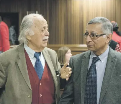  ?? Picture: Yeshiel Panchia ?? ‘UNFINISHED BUSINESS’. Human rights lawyer George Bizos speaks to Dr Salim Essop at the High Court in Pretoria yesterday during the new inquest into the death in detention of anti-apartheid activist Ahmed Timol.