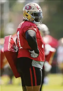  ?? Thearon W. Henderson / Getty Images ?? Trent Williams works out in July. He limped off the practice field Monday and his condition is being evaluated.