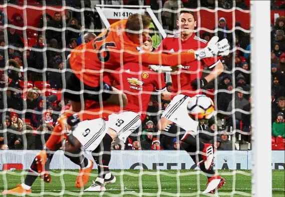  ?? — Reuters ?? The blue-eyed boy?: Manchester United’s Nemanja Matic scoring the second goal against Brighton in the FA Cup quarter-final match at Old Trafford on Saturday. United won 2- 0.