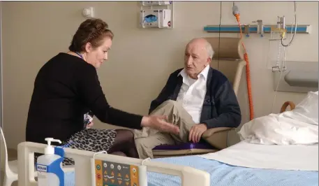  ??  ?? Margaret Sleater helping a patient at the Mater Hospital recently.