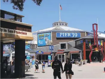  ?? JEFF CHIU AP FILE ?? San Francisco, home to the popular Pier 39 and Fisherman’s Wharf, will be able to open indoor activities at limited capacity. The Bay Area instituted the nation’s first lockdown last year.