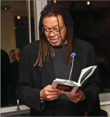  ?? DONALD BOWERS — GETTY IMAGES ?? Quincy Troupe, California’s first poet laureate, is one of three recipients this month of the L.A. Review of Books — UCR Department of Creative Writing Lifetime Achievemen­t Award. He’s shown reading at a 2012fundra­iser in New York.