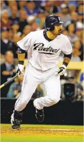  ?? U-T FILE PHOTO ?? Adrian Gonzalez batted .298 with 31 homers while driving in 101 runs in his last season with San Diego.