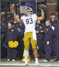  ?? Paul Sancya / Associated Press ?? Notre Dame wide receiver Chase Claypool celebrates a catch against Michigan in Ann Arbor, Mich., on Oct. 26.