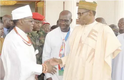  ??  ?? L-R: Oba Ewuare II, Oba of Benin; Godwin Obaseki, governor, Edo State; and President Muhammadu Buhari, during the President’s visit to the Oba’s Palace, in Benin City, Edo State.