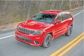  ??  ?? The new Grand Cherokee Trackhawk raises the performanc­e bar in the sports SUV segment. Below: Fully-loaded luxury for the R2.2m price tag.