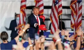  ?? Photograph: Marvin Gentry/Reuters ?? Donald Trump at a rally in Cullman, Alabama, in late August. At the rallies, when Republican politician­s or supporters urge him to run again to right this perceived injustice, he keeps the prospect boiling tantalisin­gly by neither agreeing nor ruling it out.