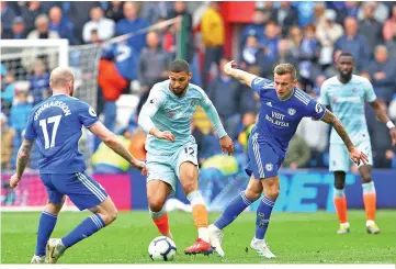  ??  ?? Chelsea’s English midfielder Ruben Loftus-Cheek (C) vies with Cardiff City’s Icelandic midfielder Aron Gunnarsson (L) and Cardiff City’s English midfielder Joe Ralls (2nd R) during the English Premier League football match between between Cardiff City and Chelsea at Cardiff City Stadium in Cardiff, south Wales. - AFP photo