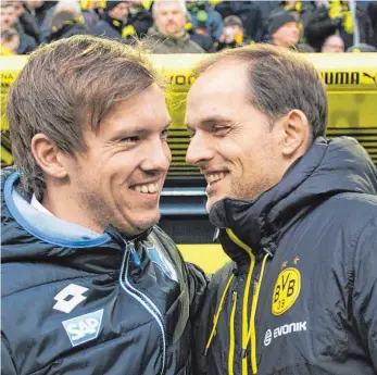  ?? FOTO: DPA ?? Junge Trainer, große Karrieren: Dortmunds Thomas Tuchel (rechts) und Hoffenheim­s Julian Nagelsmann dürften sich in den nächsten Jahren noch häufiger begegnen.