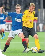  ??  ?? Fabian Lustenberg­er with Ryan Jack