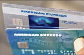  ?? ELISE AMENDOLA / AP 2016 ?? American Express now expects its corporate tax rate to be around 22 percent, down from about 30 percent the firm has paid. Executives said they plan to distribute part of the tax savings into employee profit-sharing programs; part into new initiative­s,...