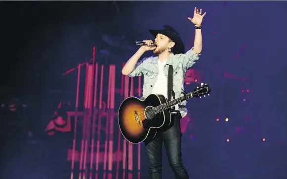  ??  ?? Brett Kissel, who kicked off the performanc­es at the Country Thunder Humboldt Broncos Tribute Concert on Friday, said he was there to help start the healing process. PHOTOS: MATT SMITH