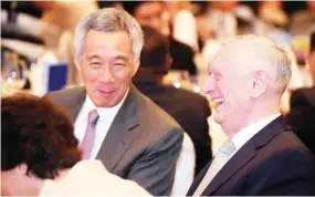  ??  ?? US Defense Secretary Jim Mattis with Singapore’s Prime Minister Lee Hsien Loong. (AP)