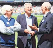  ??  ?? Members of the last New Zealand and Australian teams to play in a Boxing Day Test in 1987, John Parker (L), John Wright (C) and Greg Chappell (R) chat as they gather for a photo opportunit­y on Day 3